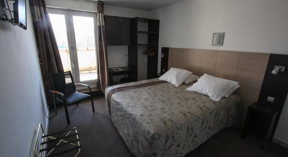 Get a peaceful night sleep in our cozy bedroom.