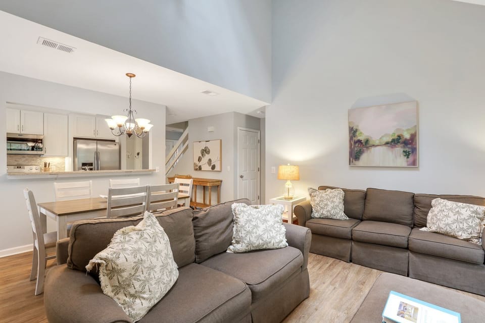 Living room with flatscreen tv and sleeper sofa.