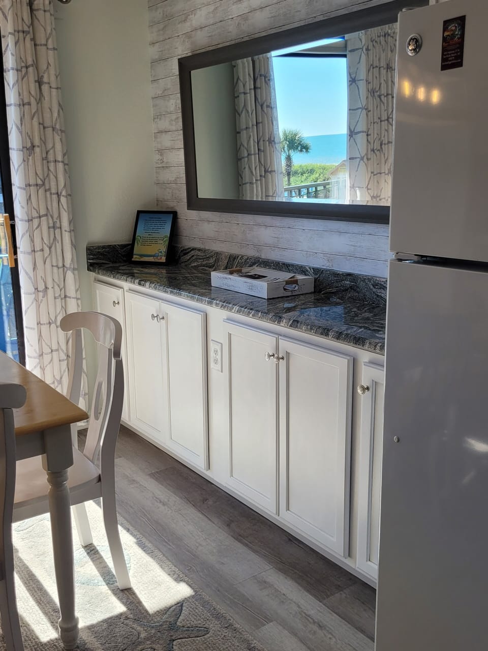 Large buffet with extra storage  check out that view caught threw the mirror 