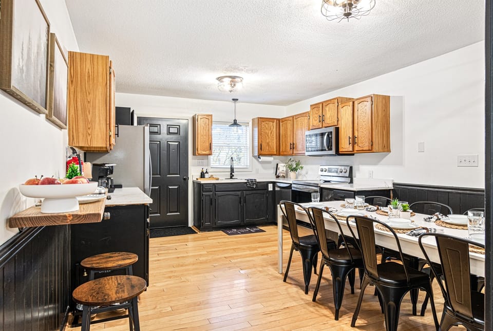 Our state-of-the-art kitchen boasts brand new appliances and a sleek Quartz countertop, making meal preparation both efficient and stylish.