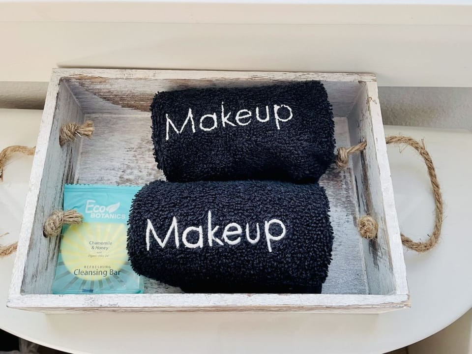Makeup towels in every bathroom, so the white ones stay white
