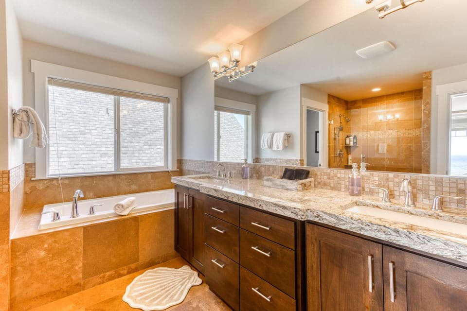 Blue Whale King Suite bath — double vanity and soaking tub