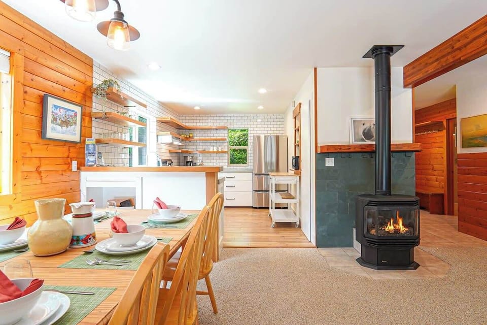 Cozy fireplace centrally located in the living room and dining room. 