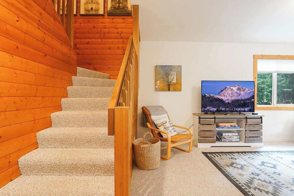 Staircase leading upstairs to bedrooms. 