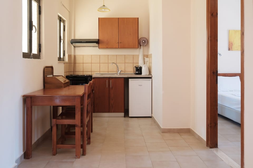 Premium Apartment, 2 Bedrooms, Garden View | Private kitchen | Mini-fridge, stovetop, electric kettle, toaster