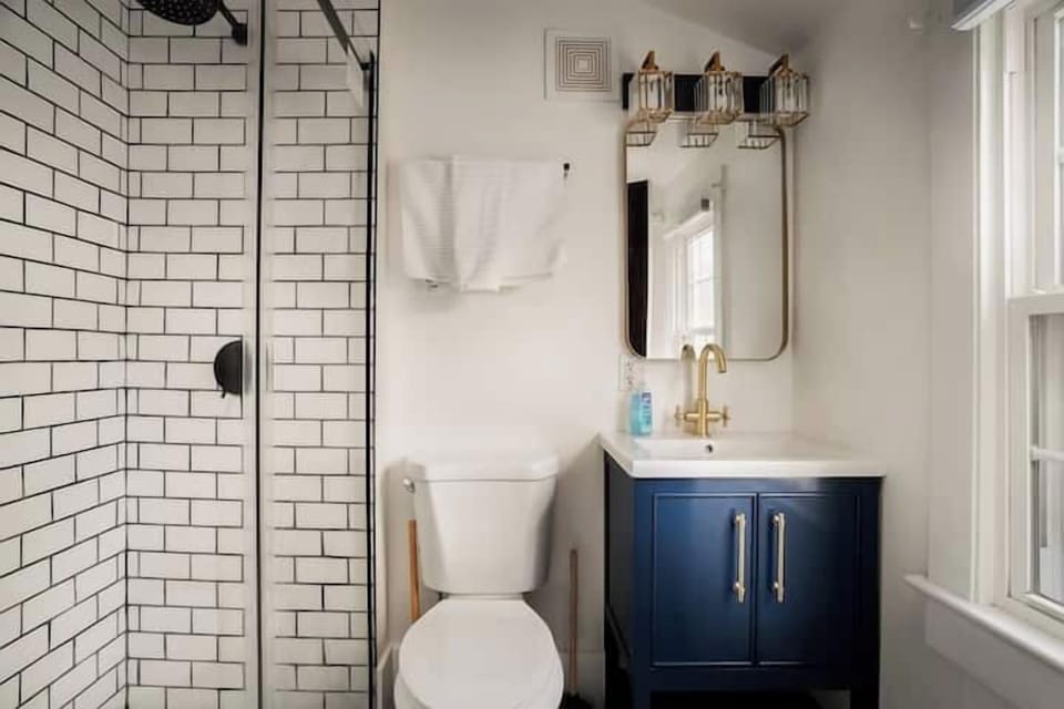 Shower room with toilet and hand basin
