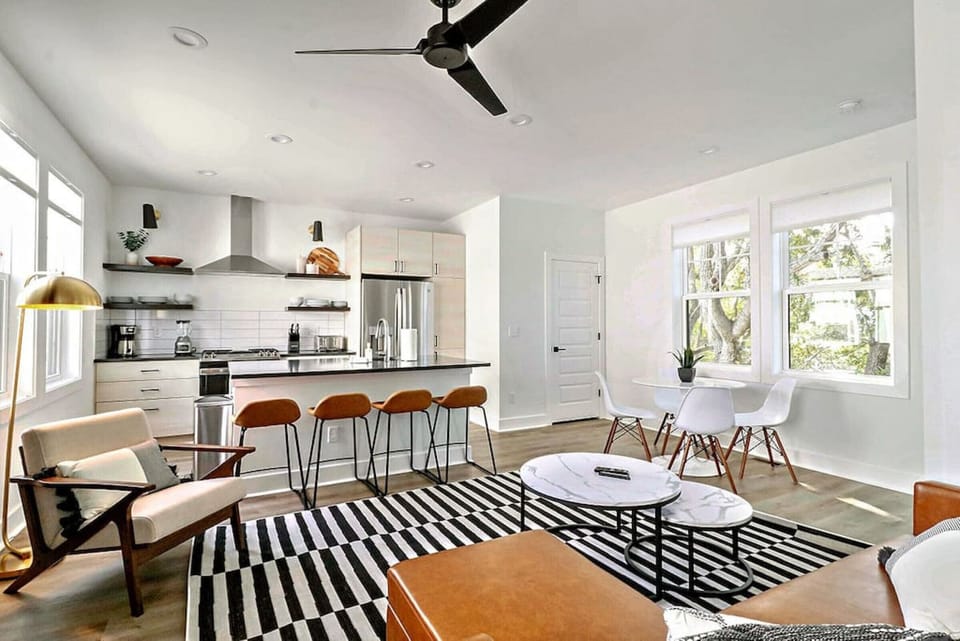 Open concept living, dining & designer kitchen.