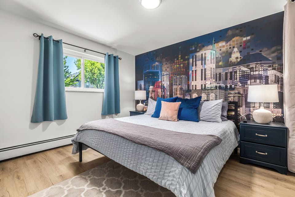 This King Bedroom features Black out curtains, double nightstands with a phone charging station and a dresser. Each bed features 4 full sized pillows!