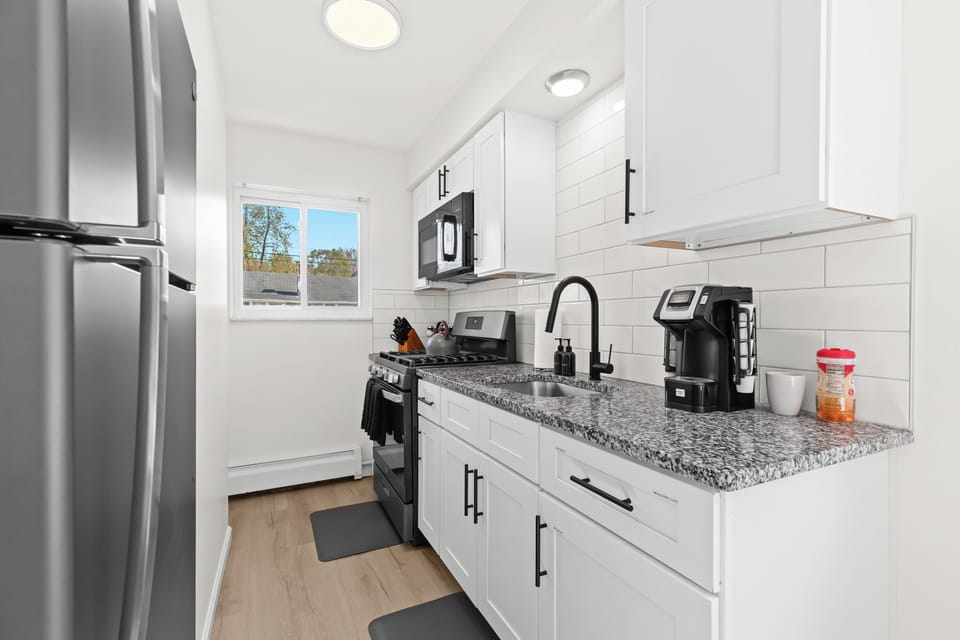 Everything is new in this sparkly clean kitchen with granite countertops.
