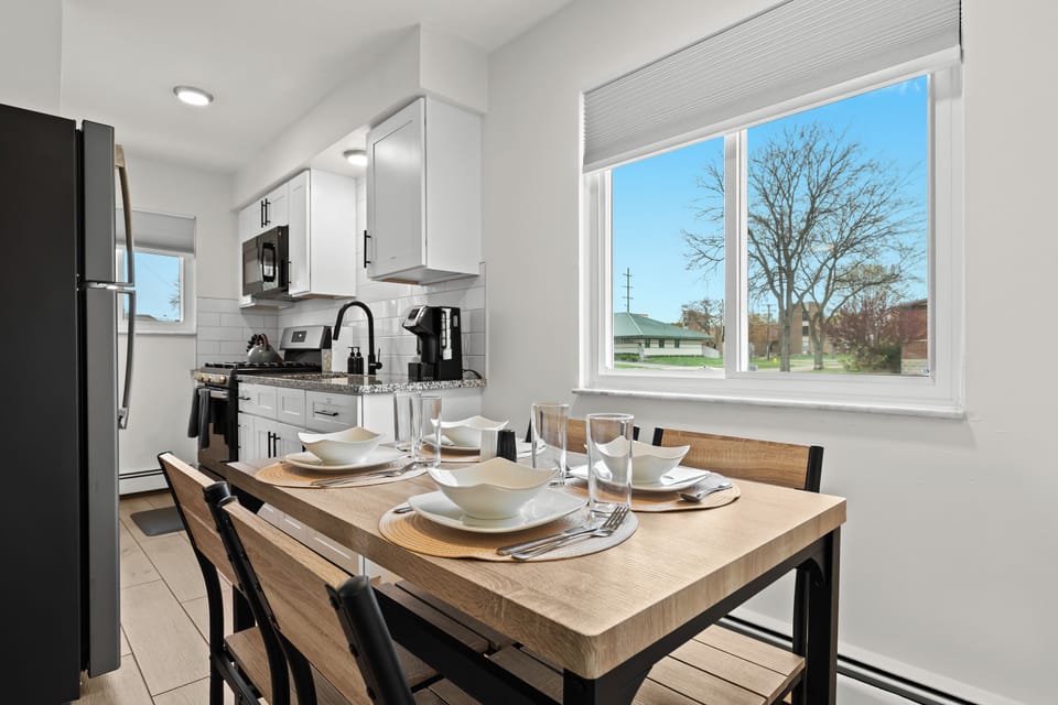 Bright kitchen with cute dining area