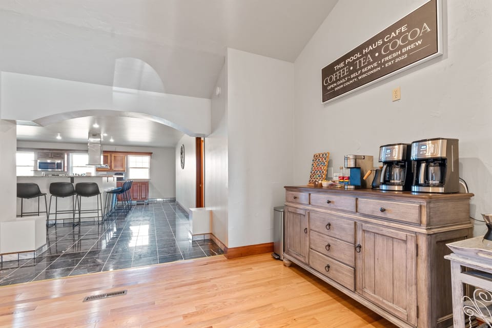 Private café space with fully stocked coffee bar—start your mornings together without ever leaving the house