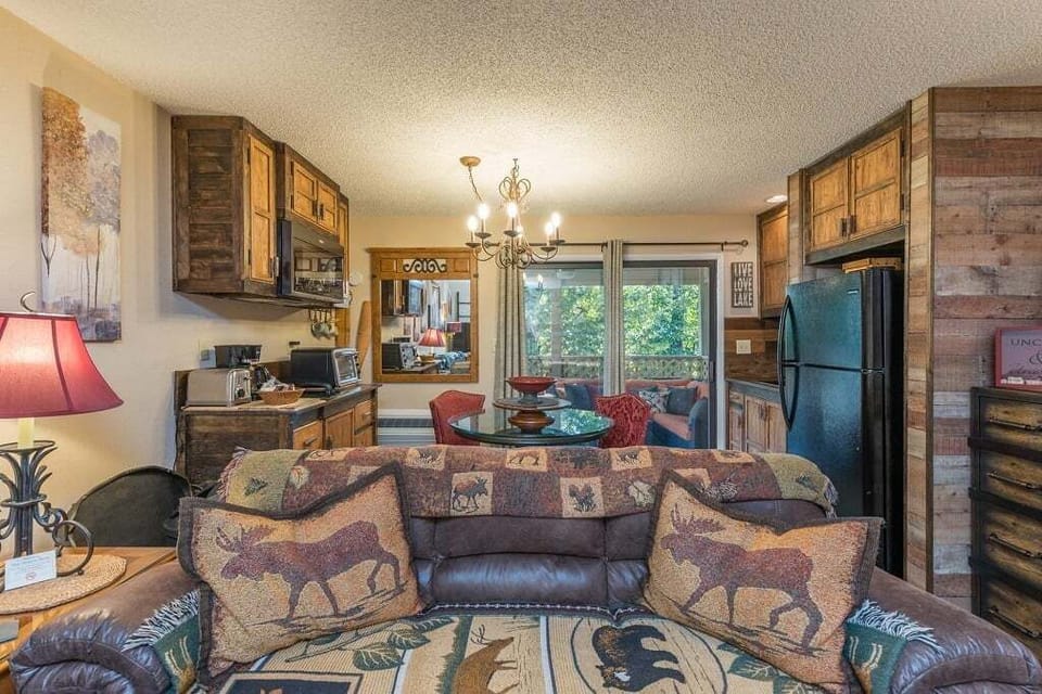 spacious couch with mountain themed accents