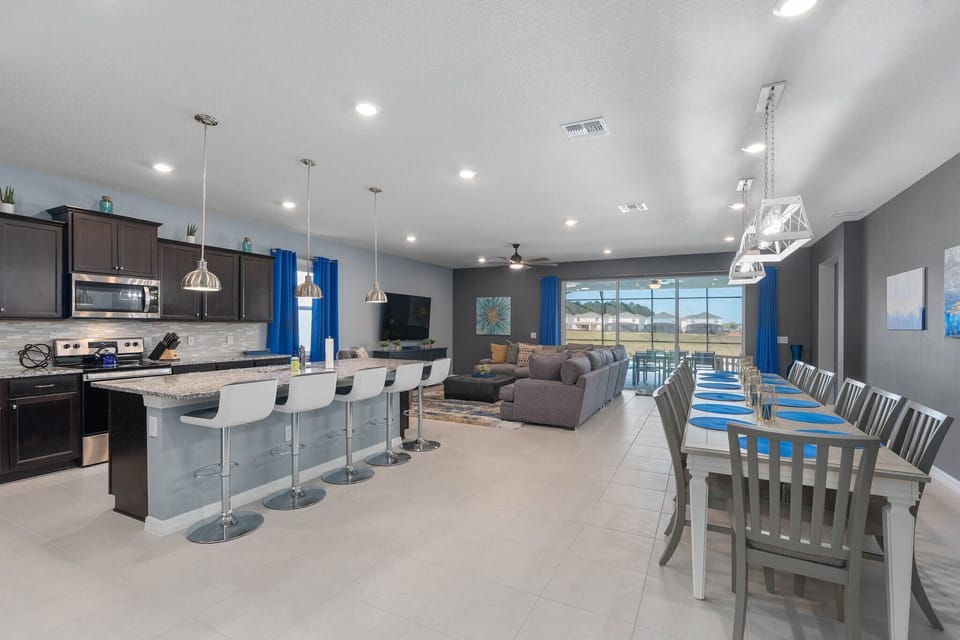 Kitchen island seats 5, table sits 14