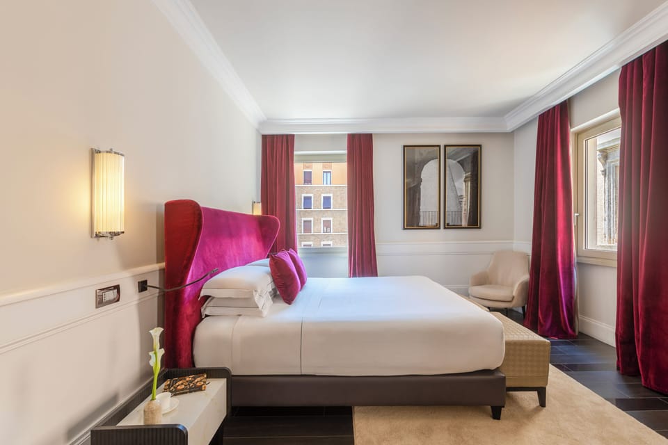 Premium bedding, down comforters, pillowtop beds, minibar