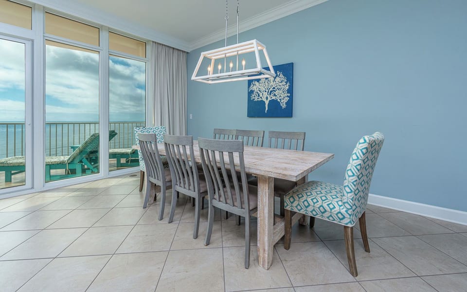 Gather around the spacious dining table, enjoying coastal views as you share laughter and stories with loved ones