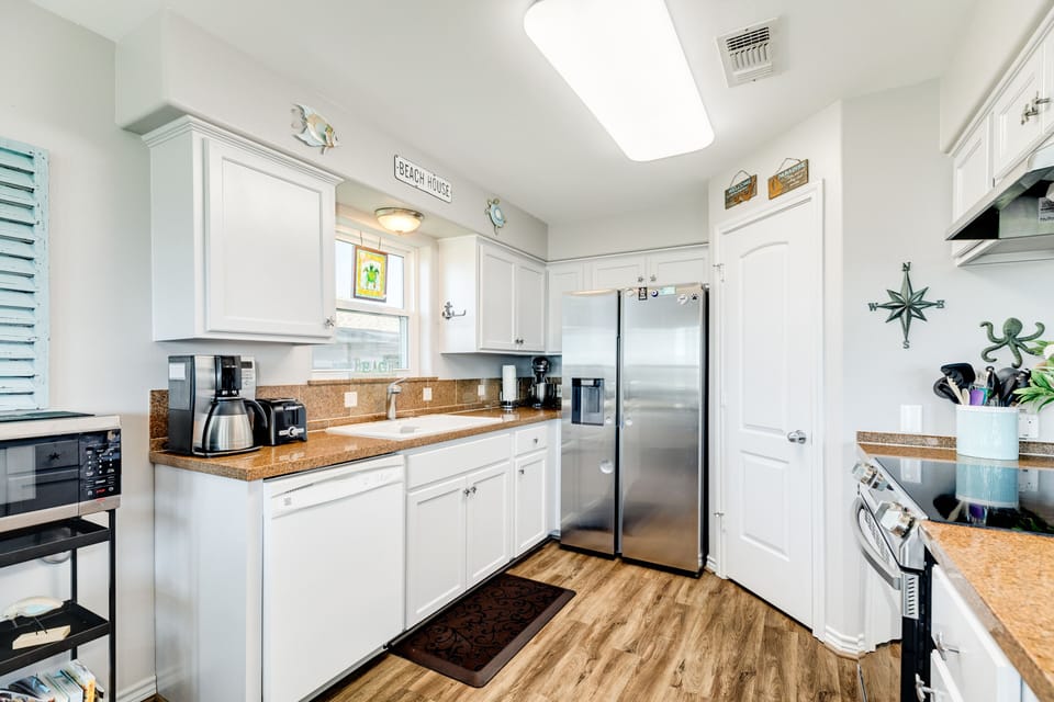 Prepare home cooked meals in the fully equipped kitchen