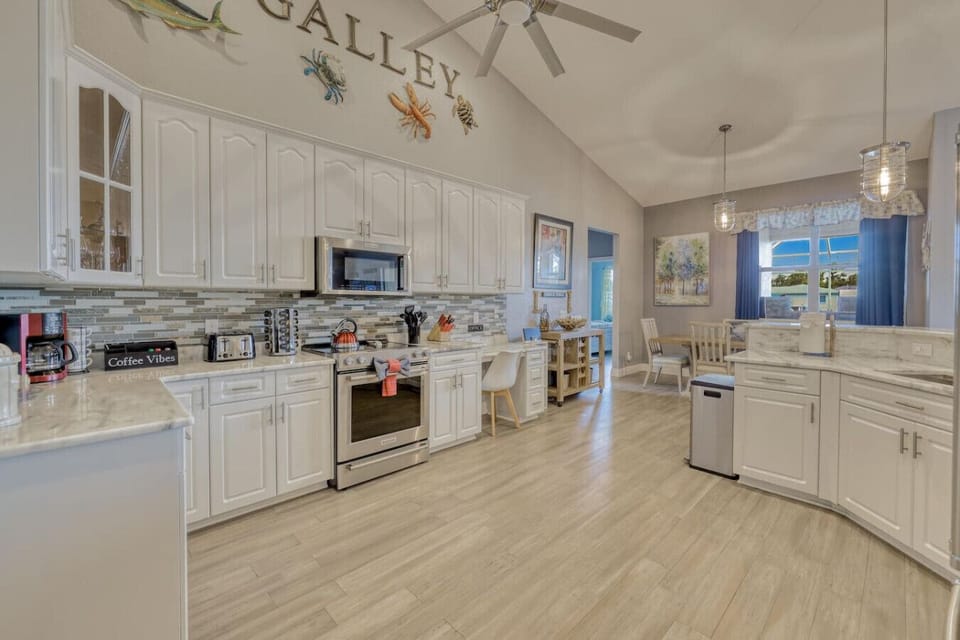 open kitchen with granite countertops and fully loaded with everything you need