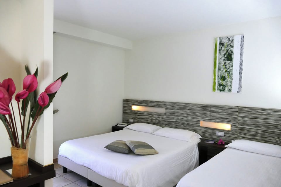 Standard Triple Room | Minibar, in-room safe, blackout drapes, cribs/infant beds