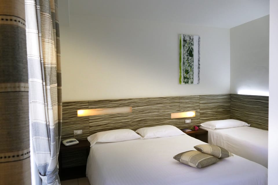 Standard Triple Room | Minibar, in-room safe, blackout drapes, cribs/infant beds