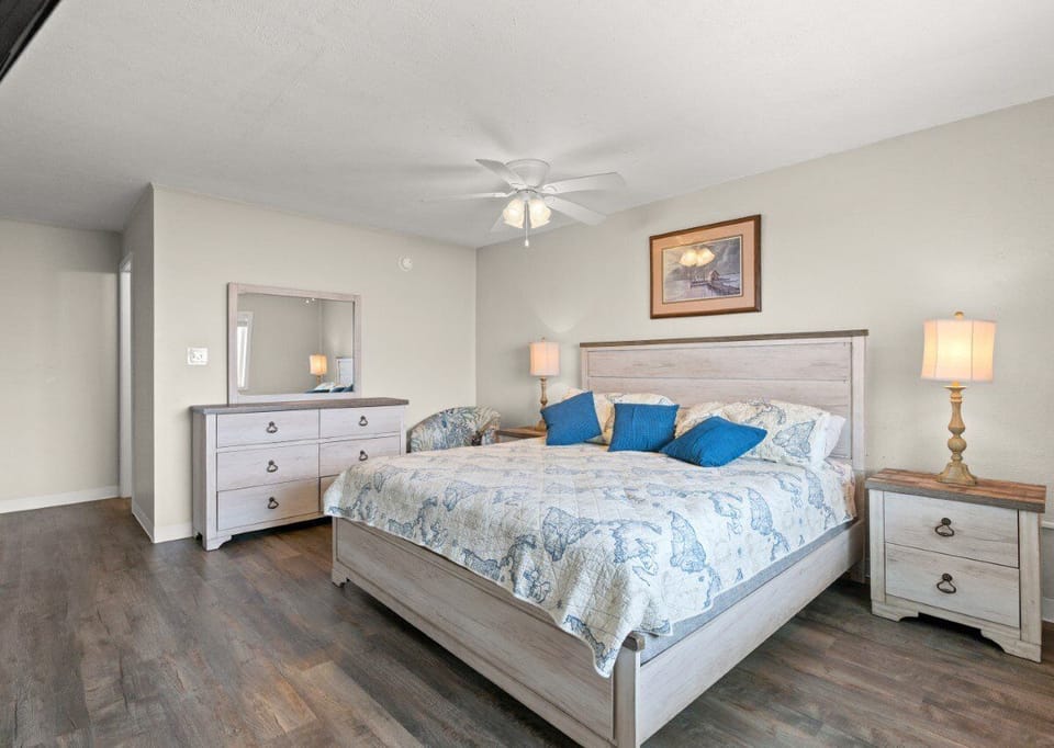 King suite with private bath — quiet comfort after ocean days.