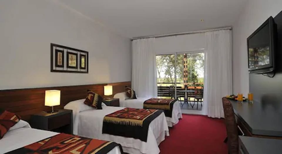 Standard Triple Room | Minibar, in-room safe, desk, soundproofing