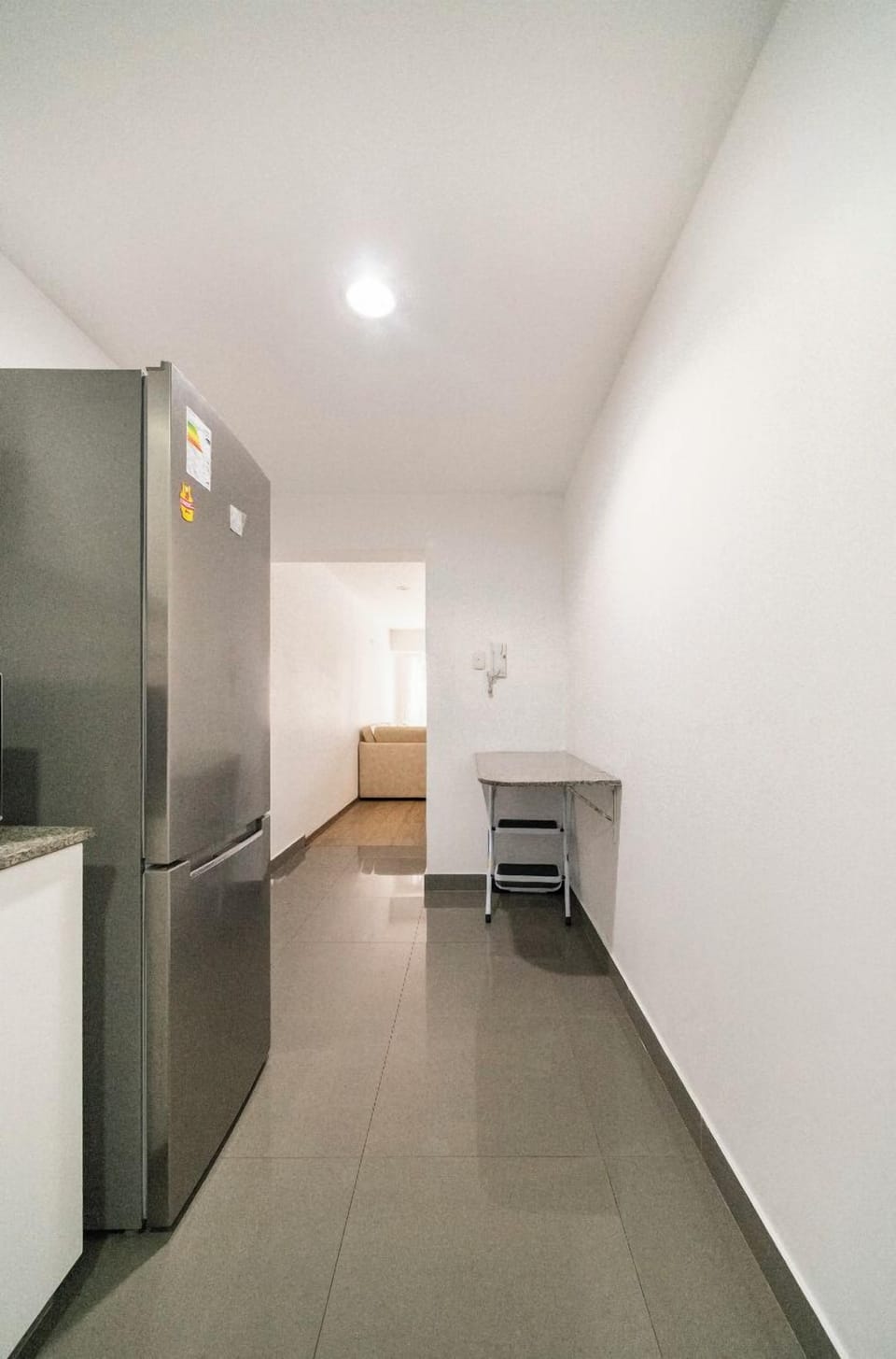 Hallway between kitchen and living room 