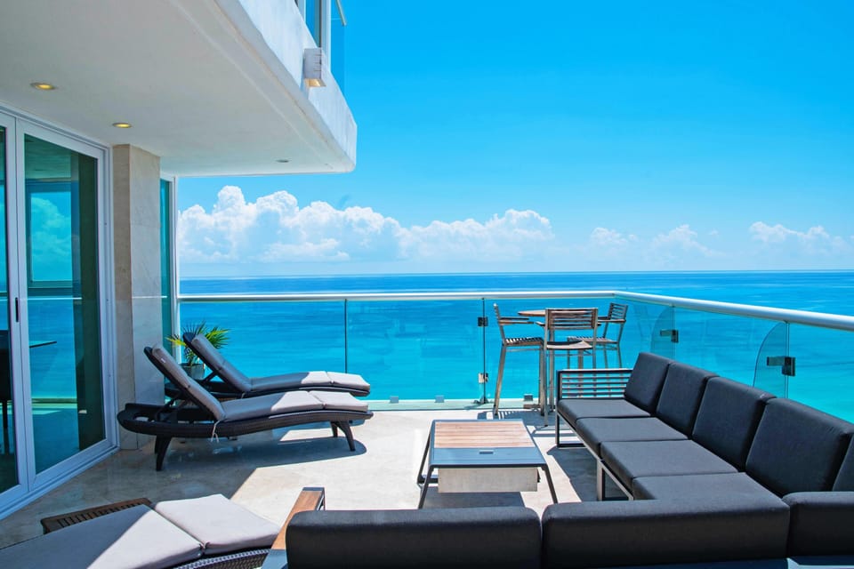Penthouse 2 of Combo #201: The Penthouse faces the Ocean - Huge Private Terrace Features a Sofa Set, 2 Sun Loungers, &amp; Table with Seating for 8