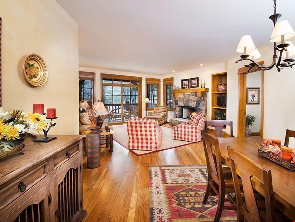 Warm up by the fireplace or entertain at the dining table.