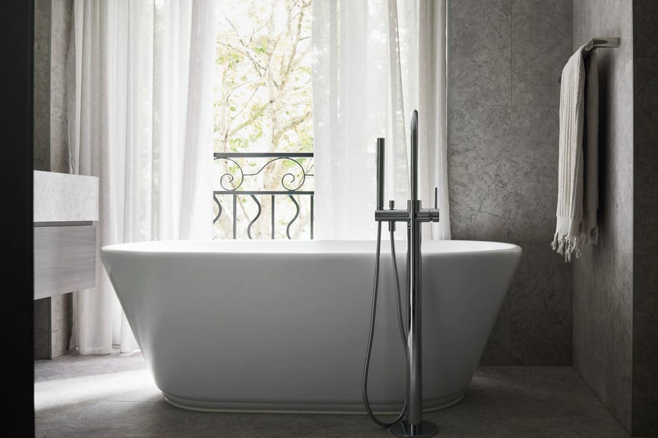 Executive Room | Bathroom | Designer toiletries, hair dryer, bathrobes, slippers