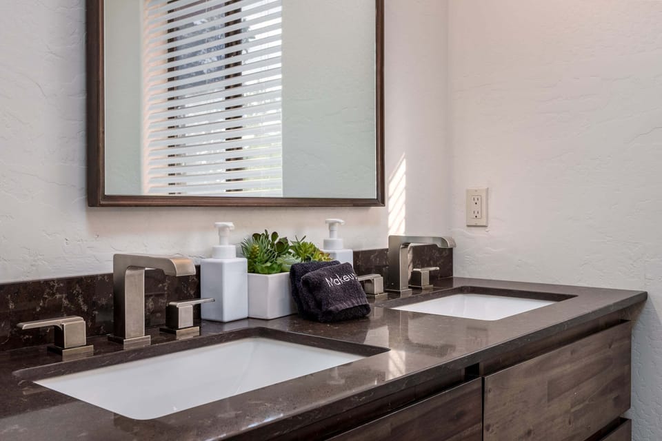 Start your day with ease at the dual-sink vanity, offering plenty of space to refresh and get ready.