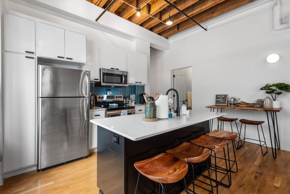 Beautifully updated and fully stocked kitchen that includes limited spices, all pots and pans needed for cooking and a full coffee bar. 