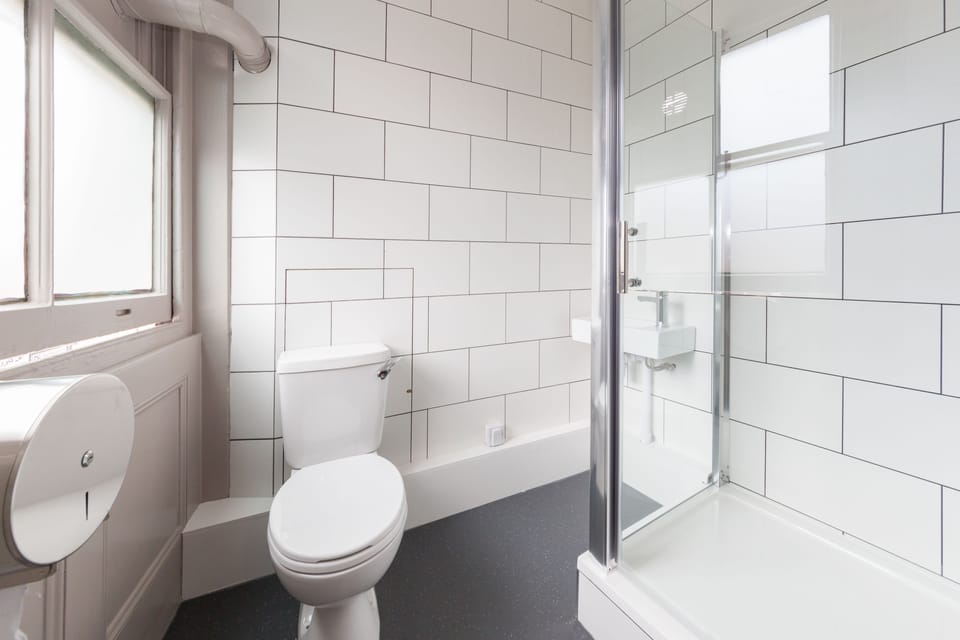 Shower, hair dryer, soap, shampoo