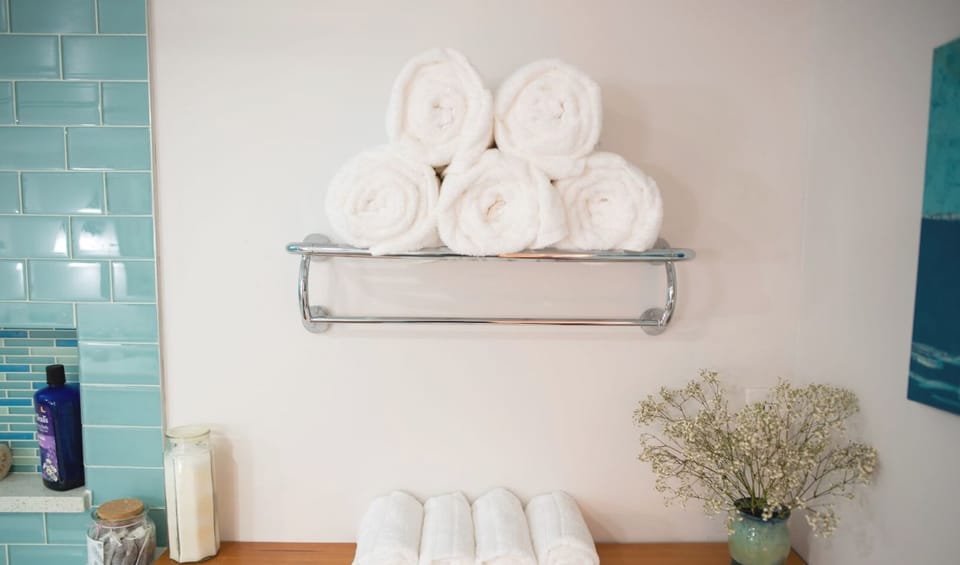 Clean bathroom with  fresh towels