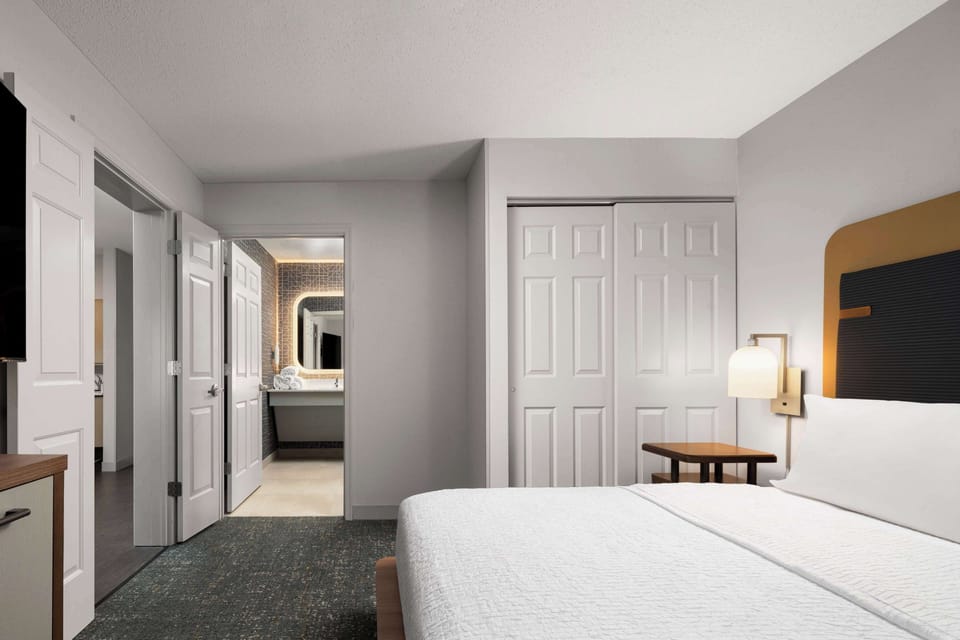 Premium bedding, down comforters, desk, laptop workspace