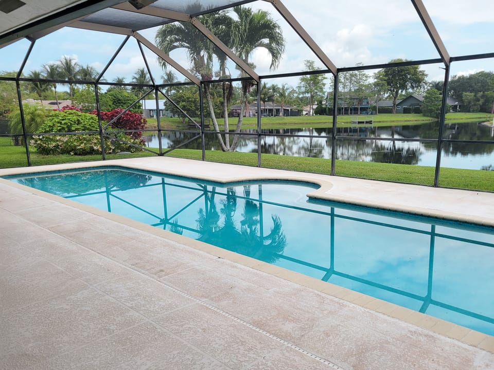 BEAUTIFUL HEATED POOL RIGHT ON THE LAKE.