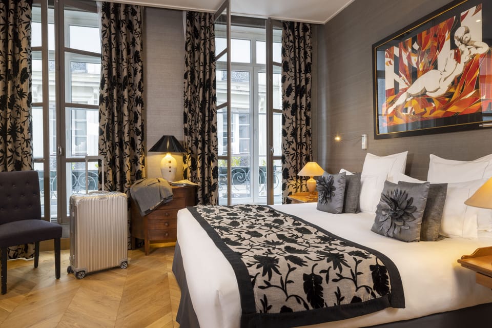 Hypo-allergenic bedding, pillowtop beds, minibar, in-room safe