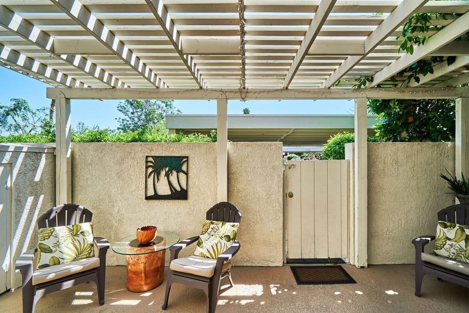Another view of the back patio, which also has a charcoal grill