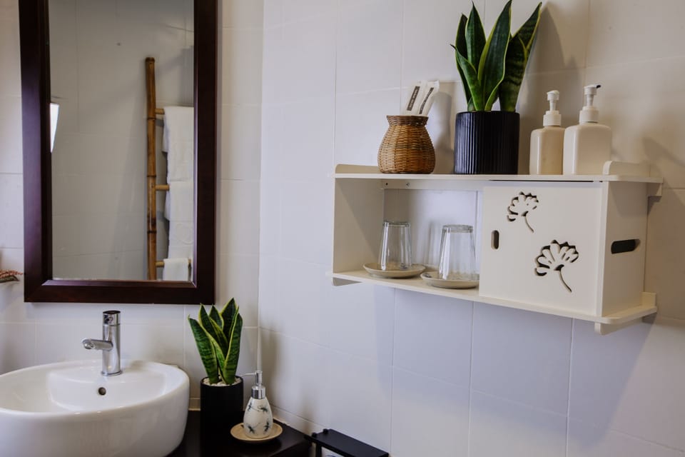 Double Room (Star Anise) | Bathroom | Shower, free toiletries, hair dryer, slippers