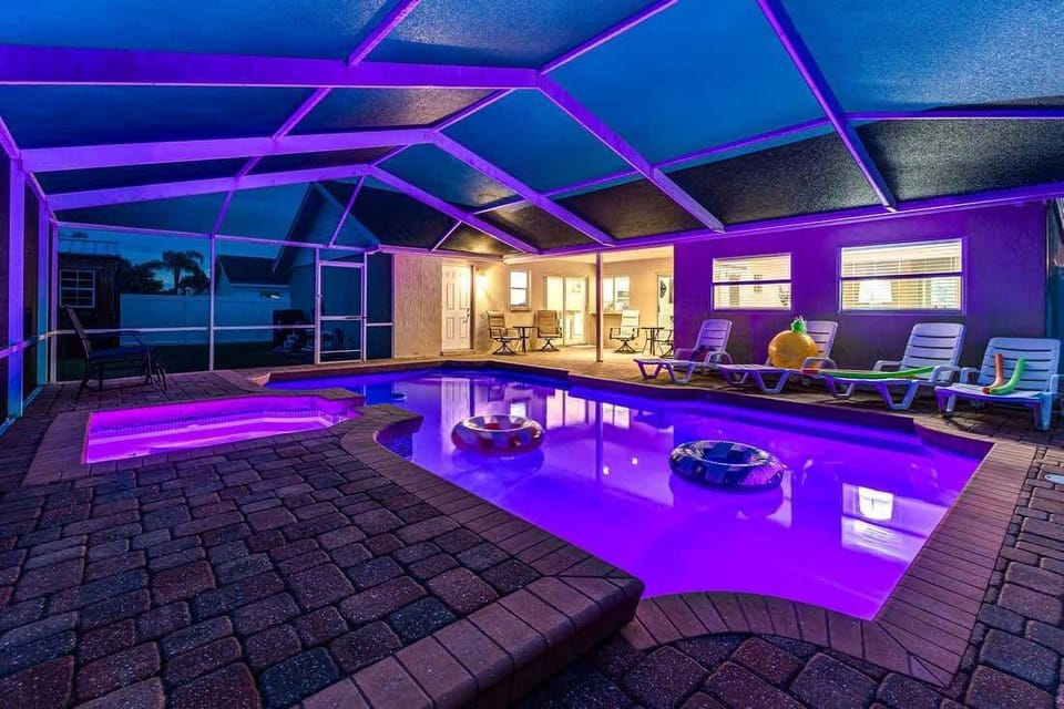 Enjoy our pool and Jacuzzi, perfect for nighttime swims. The area is beautifully lit with accent lighting, creating a serene ambiance. Pool floats and noodles are available, along with swim jackets for kids. 