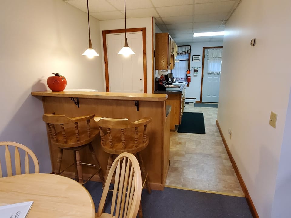 Dining area flows to kitchen area