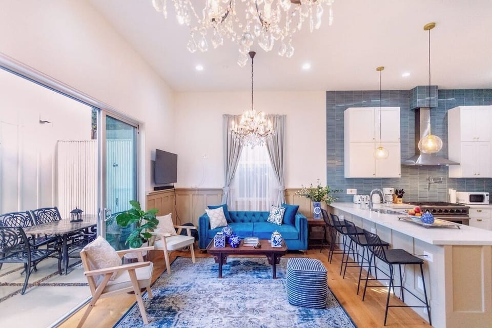 The large 1000 sq ft living space connects to the outdoor garden