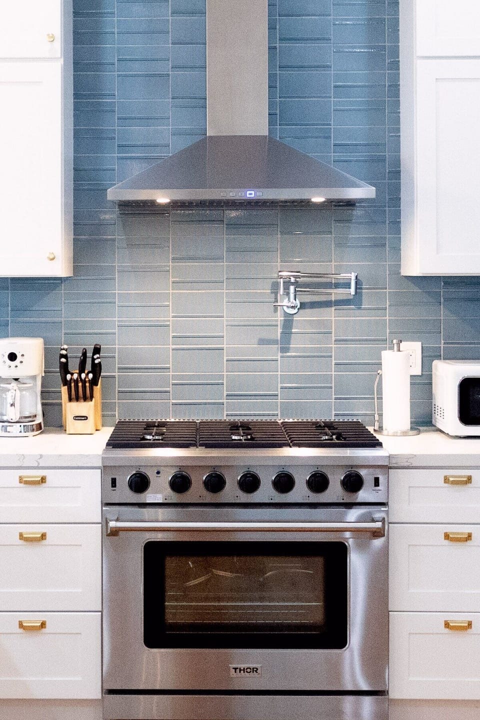 6 burner THOR gas stove/oven, pot filler faucet, designer appliances in the kitchen!