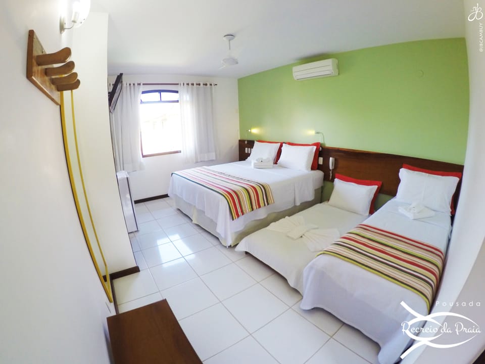 Quadruple Room | Minibar, in-room safe, blackout drapes, bed sheets