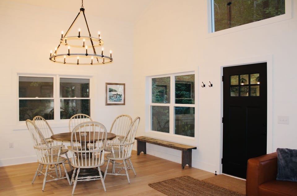 Dining room with multi-tier chandelier 