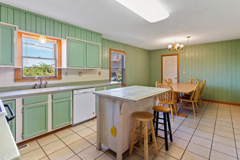 Whip up something delicious in the bright Kitchen with modern appliances and a chic, vintage feel.