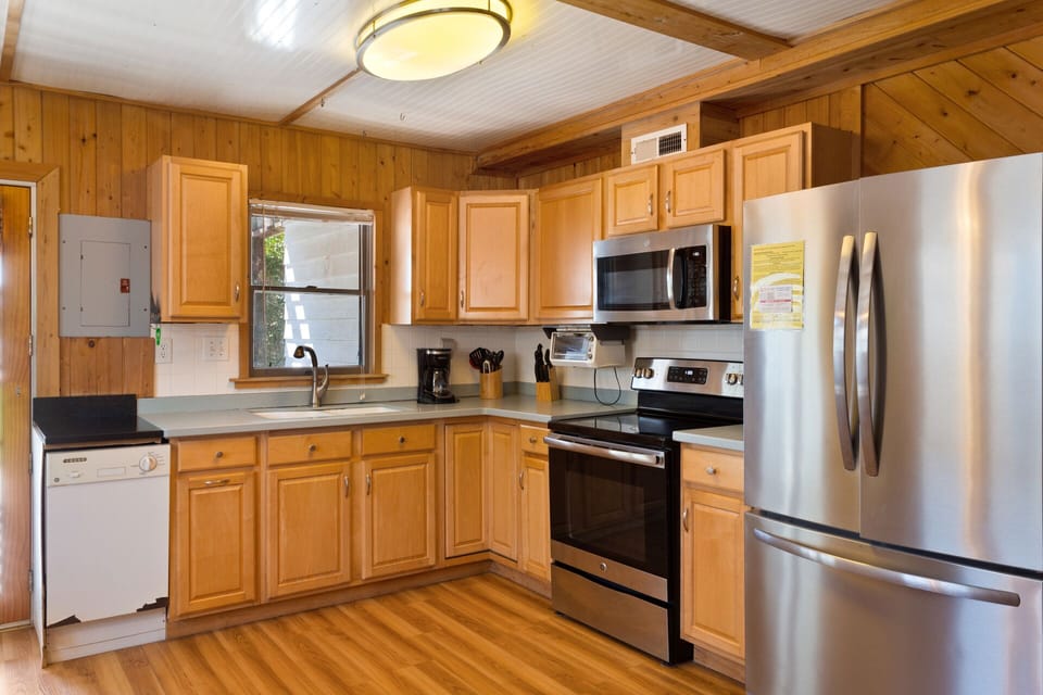 Prepare delicious coastal favorites in the fully equipped Kitchen with modern appliances and a convenient dishwasher.