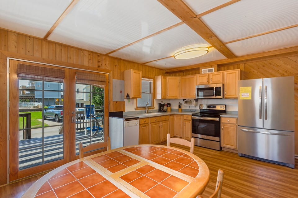 Prepare delicious coastal favorites in the fully equipped Kitchen with modern appliances and a convenient dishwasher.