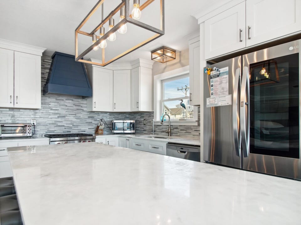 Whip up something delicious in the Gourmet Kitchen with luxurious Wolf appliances and a Convection Steam Oven that is perfect for preparing fresh, local Outer Banks seafood.