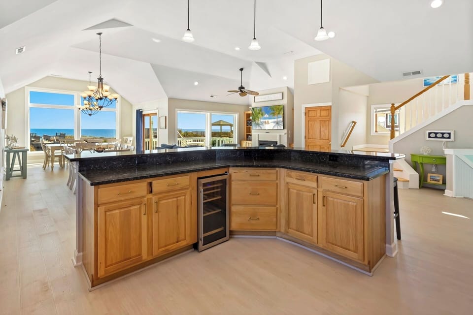 Cook up some fresh, local seafood in the open-concept Kitchen where 2 Dishwashers and a Wine Refrigerator await to help you make a spectacular meal that the whole family will enjoy.