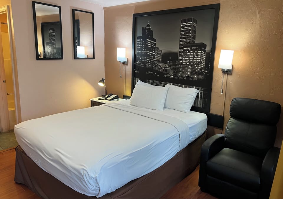 Room, 1 Queen Bed | Desk, iron/ironing board, rollaway beds, free WiFi